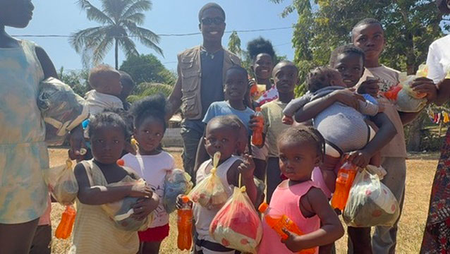 Joel with the local kids that just receive gift for Christmas 2024